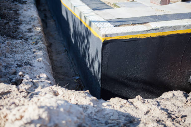 Professional Waterproofing technician working in Jasper, IN